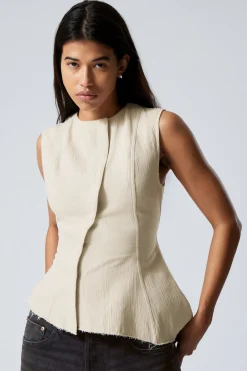 ÄRMELLOSES ASYMMETRISCHES SCHÖSSCHEN-TOP|Weekday Discount